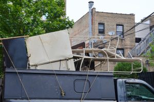 how to load a dumpster